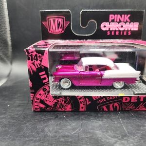 Pink and White Die-Cast Model Car